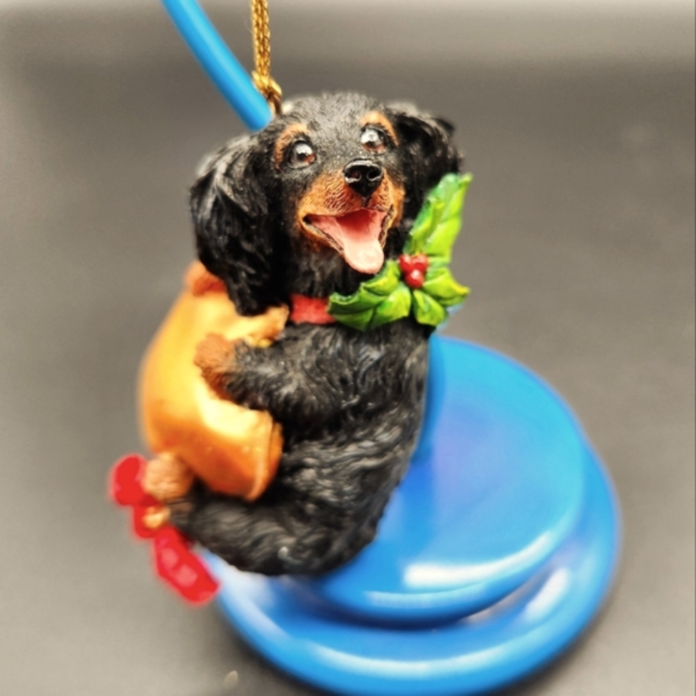Danbury Mint Delightful Dachshunds Christmas Ornament Swinging on a Star
